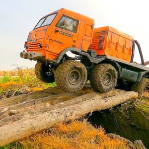 RC TRUCKS Stuck in MUD – Rescue WINCH and Deep River Crossing Kamaz 8x8 and MAN KAT 6x6