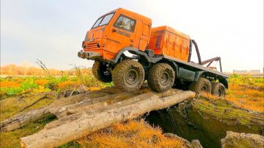 RC TRUCKS Stuck in MUD – Rescue WINCH and Deep River Crossing Kamaz 8x8 and MAN KAT 6x6