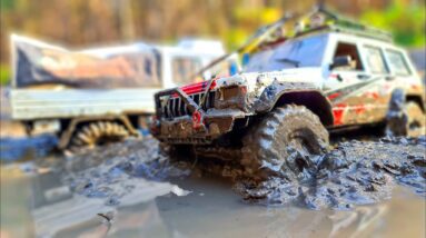 Off-Road Drama: RC JEEP Cherokee and RC TRUCK Unimog Tackle Mud with Epic Winch Save!