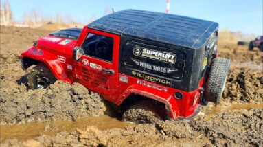 Mud Pit Mayhem: RC Nissan Patrol vs. RC Jeep Wrangler Epic Battle!