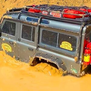 Epic Mud Rescue: RC Land Rover Defender and MAN KAT 6x6 Save the Day!