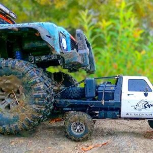 🚙💥 RC Mud War! 1/8 Land Rover vs 1/18 Chevy — Ultimate Rescue Challenge! MJX H8H vs Flatbed Fair RC