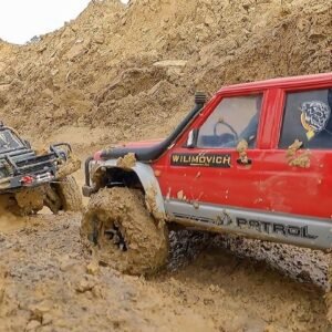 TOTAL MUD FAIL! RC Land Rover Defender SWALLOWED by Liquid Clay! Can the Nissan Patrol Save It?